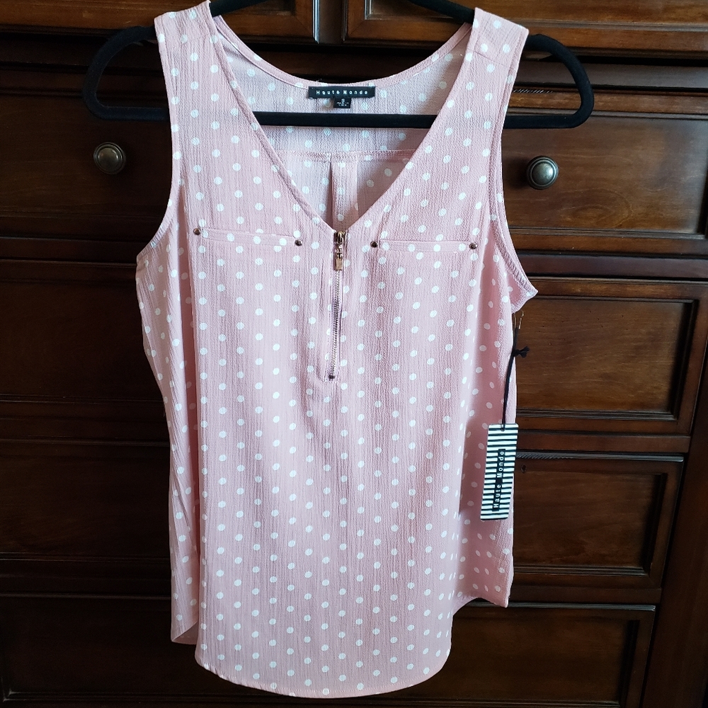 Pink and white polka dot tank top.
